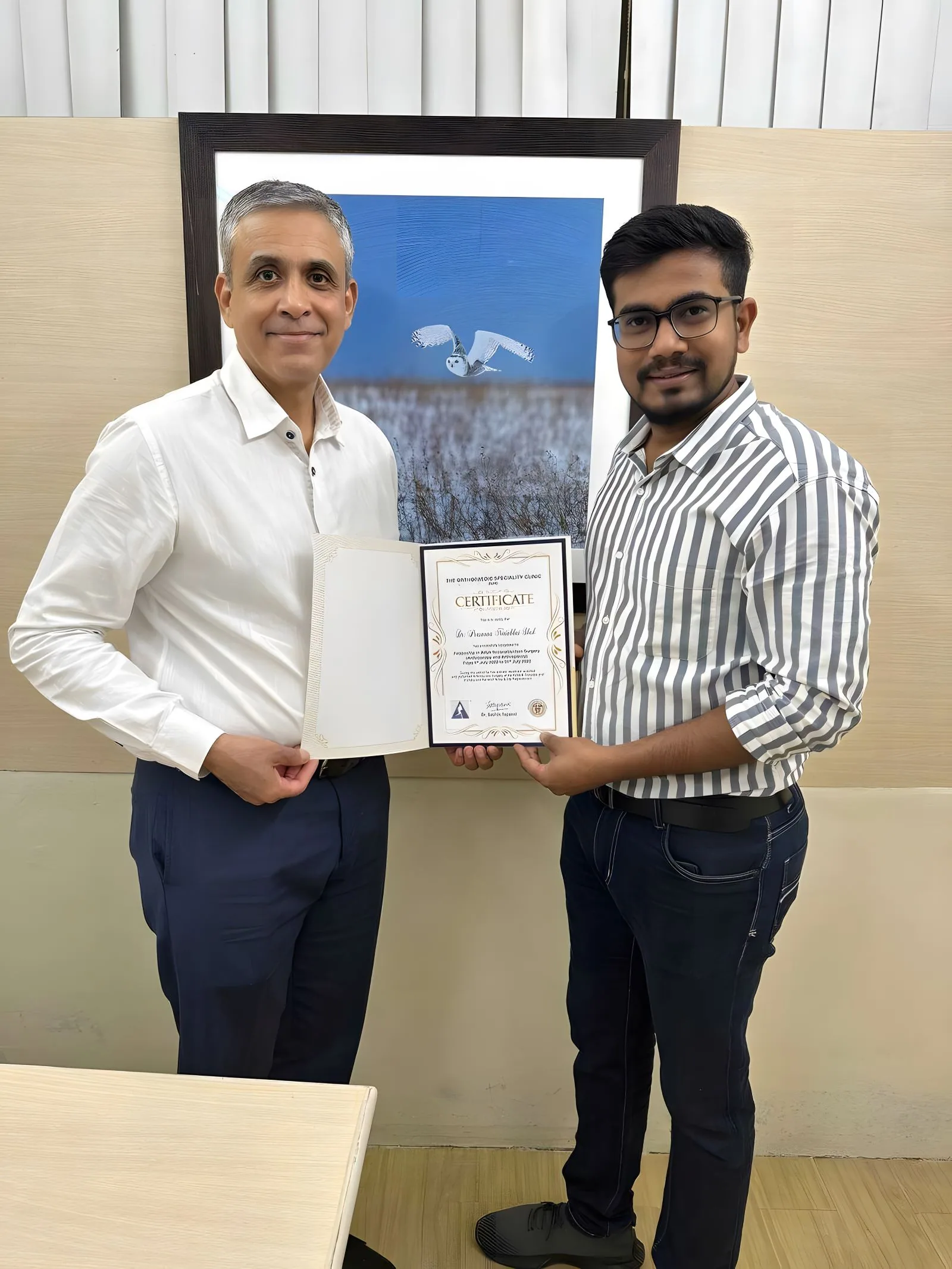 Dr. Prasanna Shah receiving a professional certificate