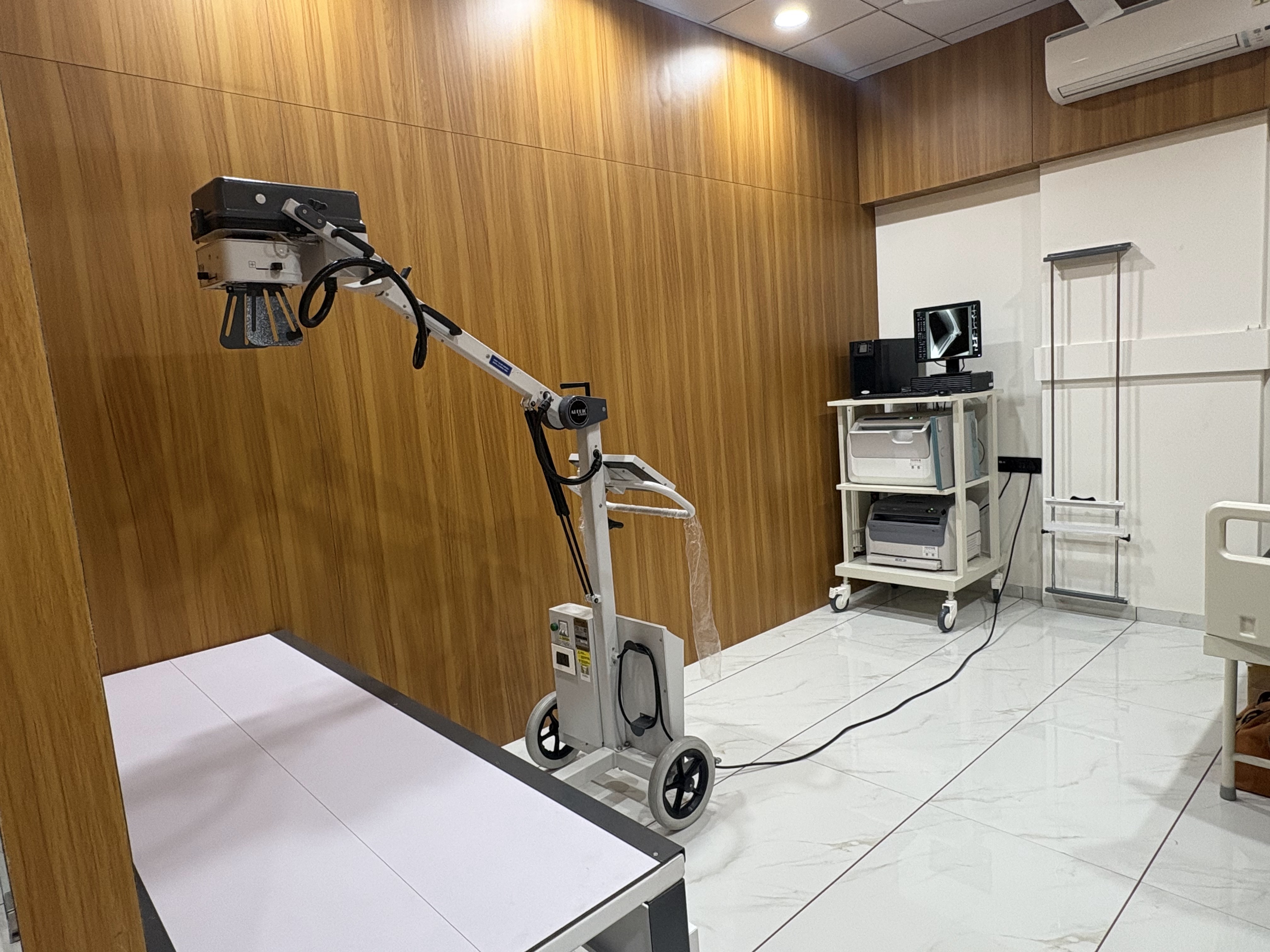 Clinical treatment room at Axios Orthopaedics